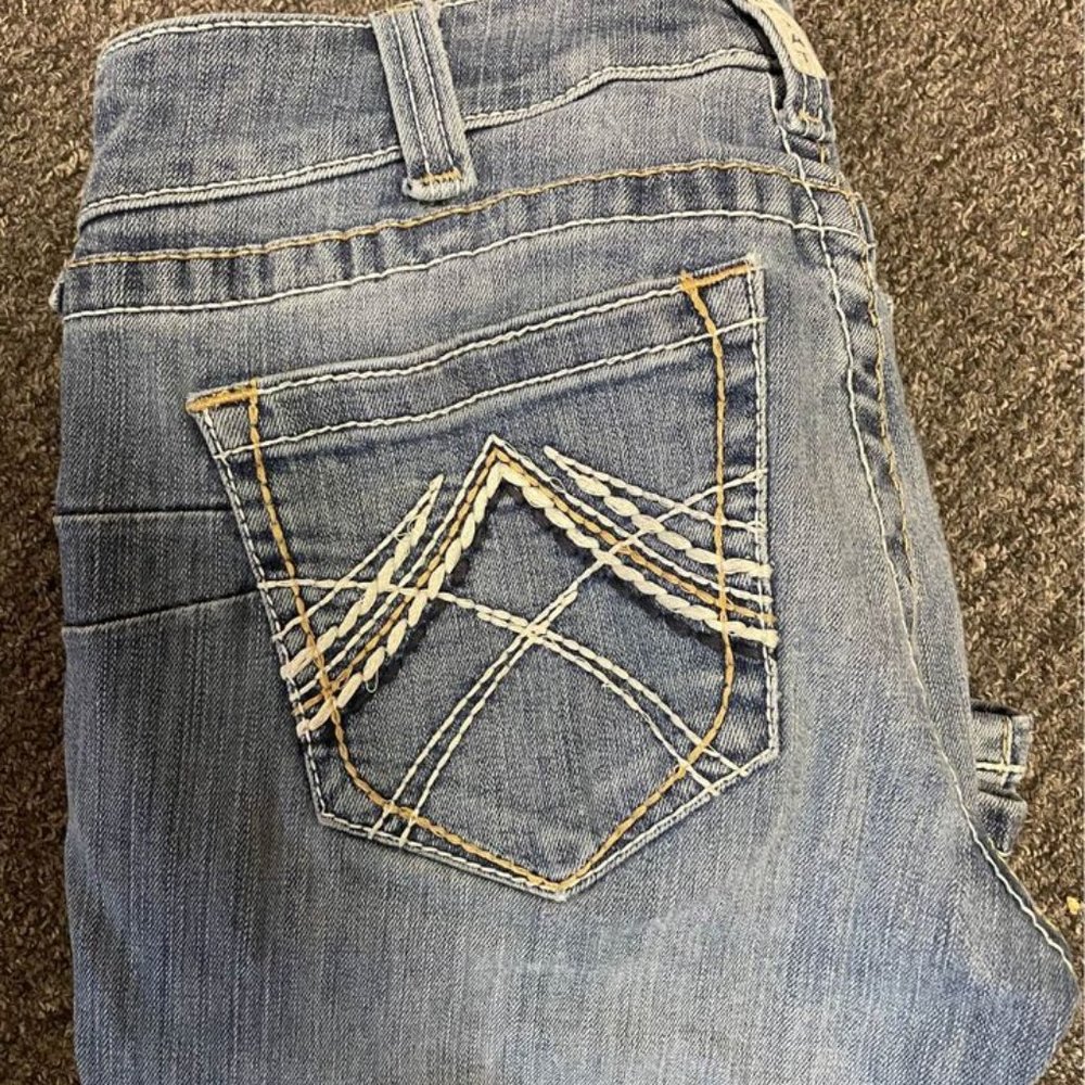 Ariat R.E.A.L. mid Rise boot cut Jean. Size 29S